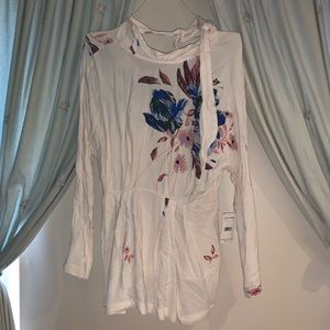 A long sleeve shirt with flowers